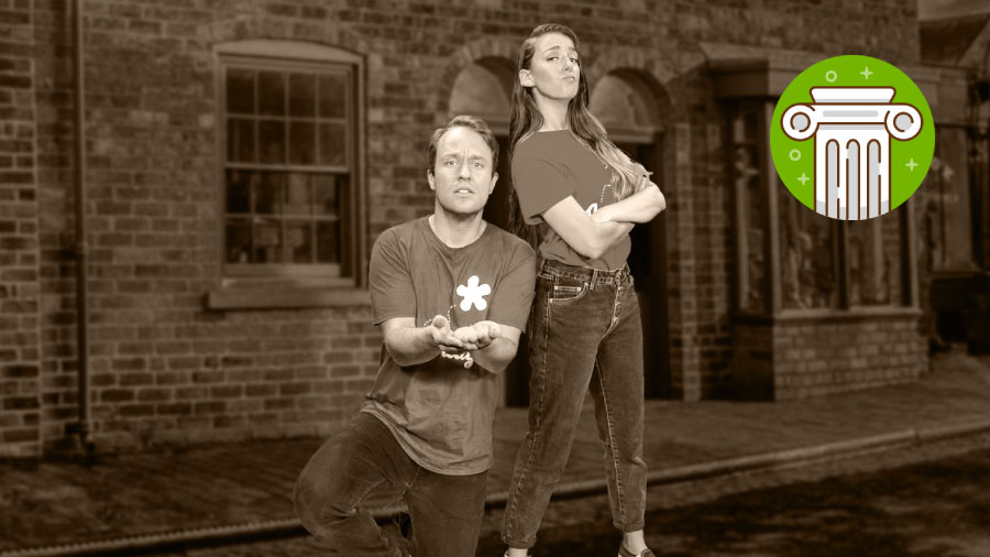 Man and woman stand on a sepia-toned Victorian street. The man begs, hands outstretched, while the woman turns away nonchalantly.